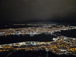 The Arctic Cathedral and Tromsø Bridge in Tromsø, Norway