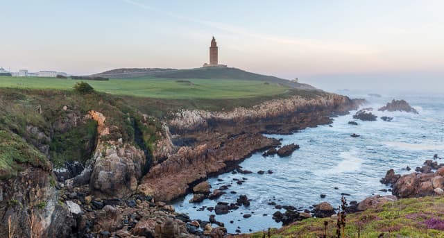 Tower of Hercules above A Coruña's Atlantic coastline at sunrise