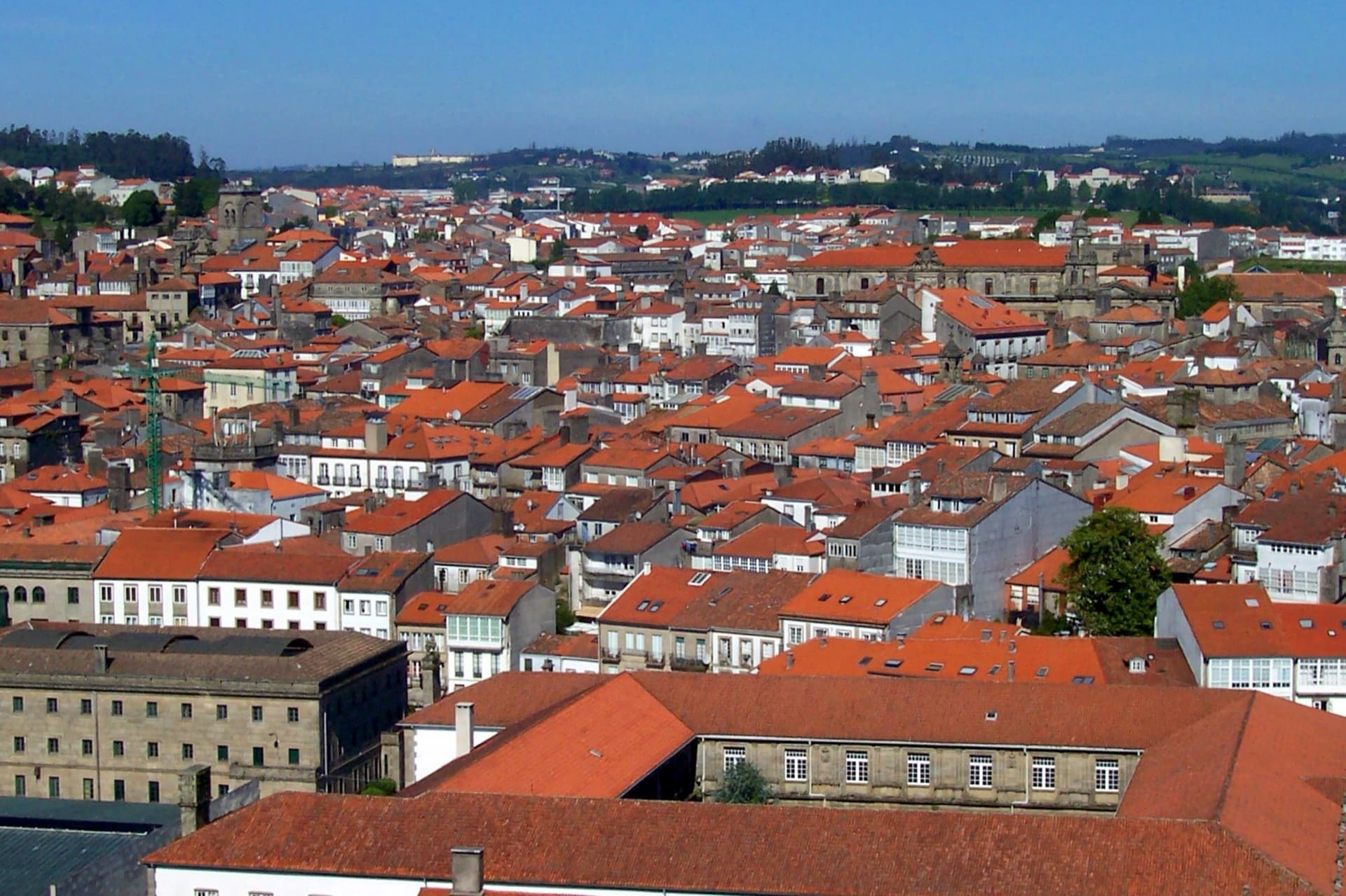 Aerial view of Santiago de Compostela's old-town roofs and towers